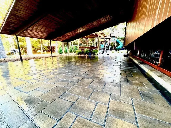 Large format paver patio under a covered roof
