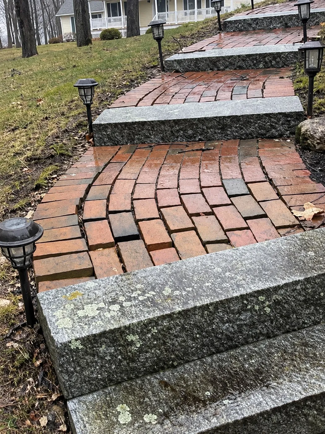 Old brick walk with granite treads and path lights