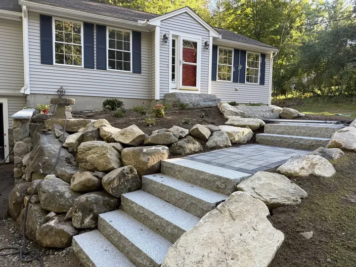 Boulders and plantings beside granite steps