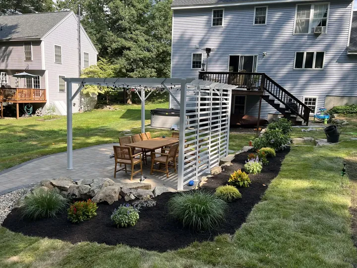 Planting bed along a pergola and patio