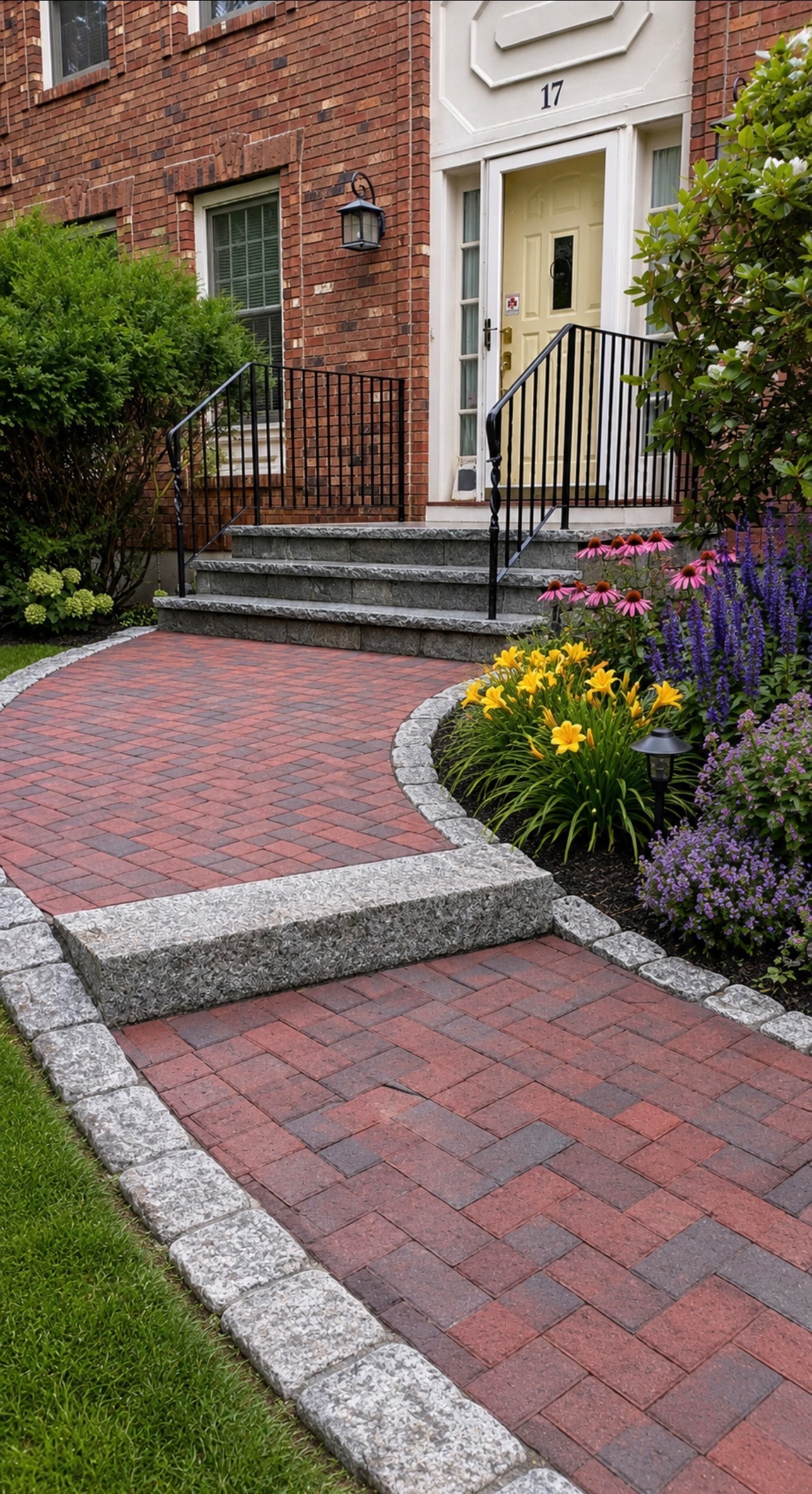 New granite-edged paver walkway and steps after renovation